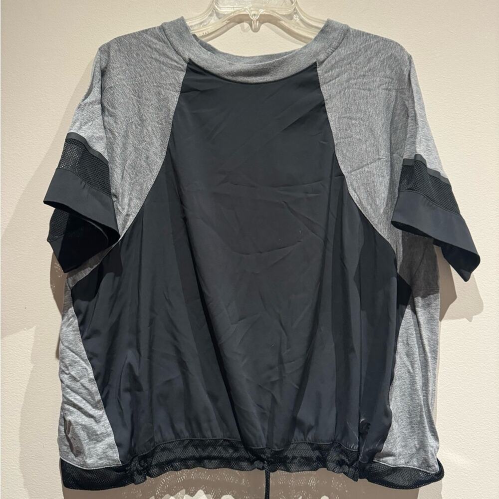 Nike gray top with mesh accents and drawstring bottom hem size XL